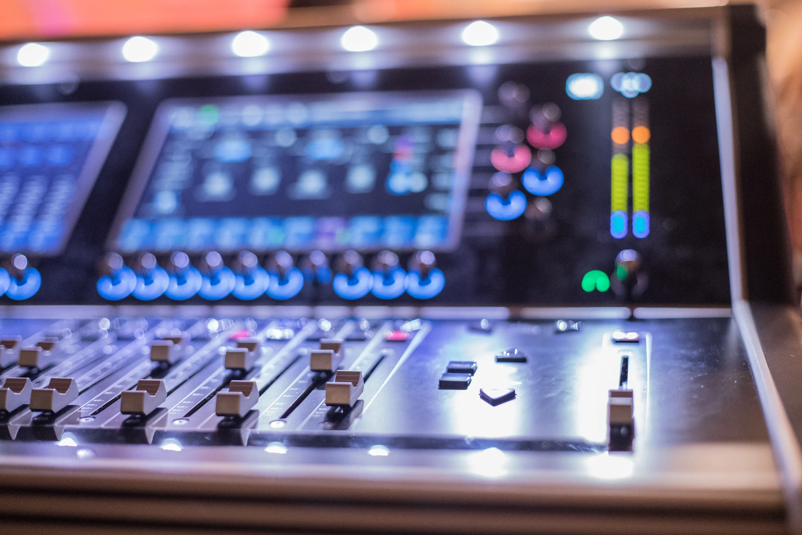 DIVA event engineering team working at a professional live audio console