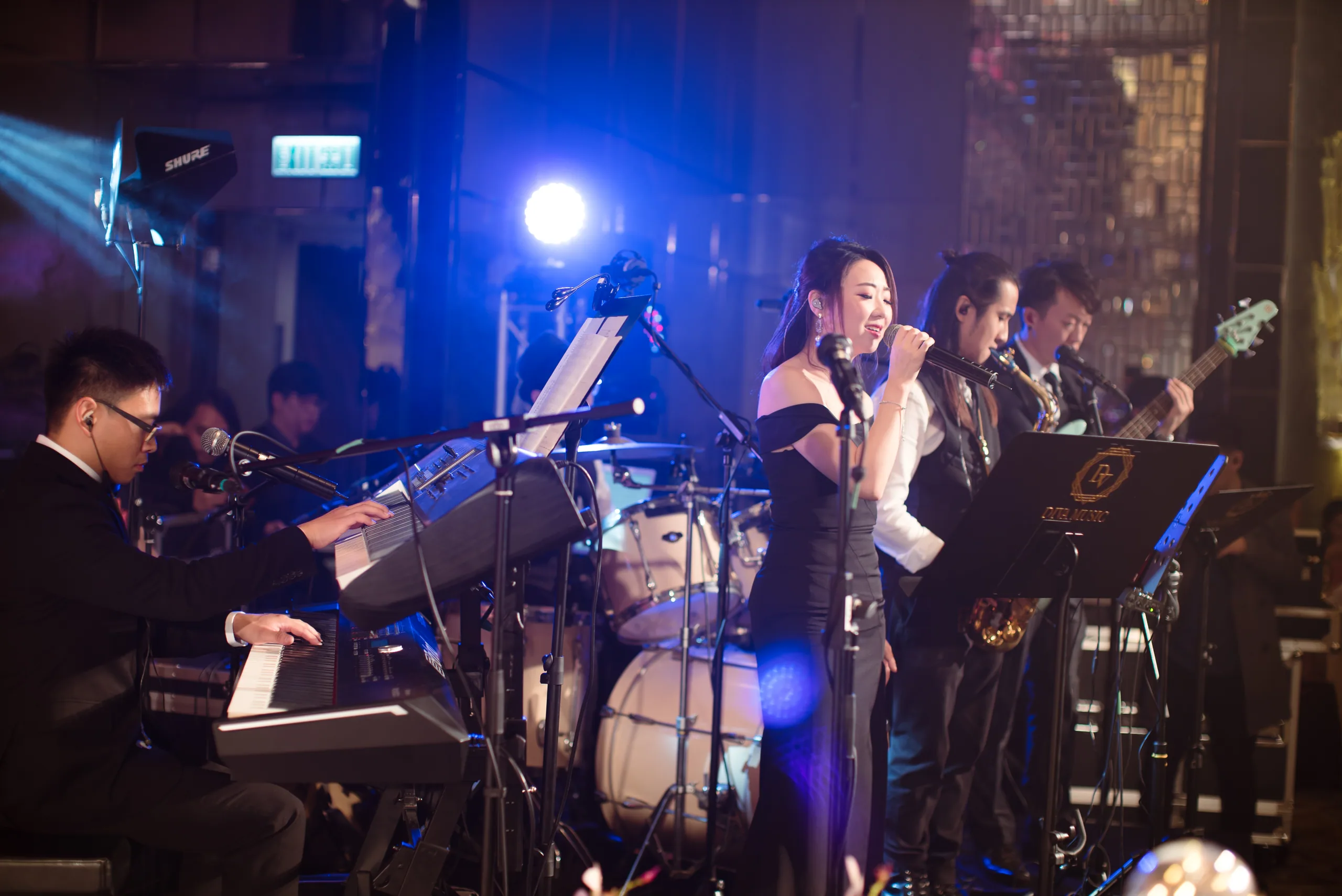 DIVA live band performing on stage